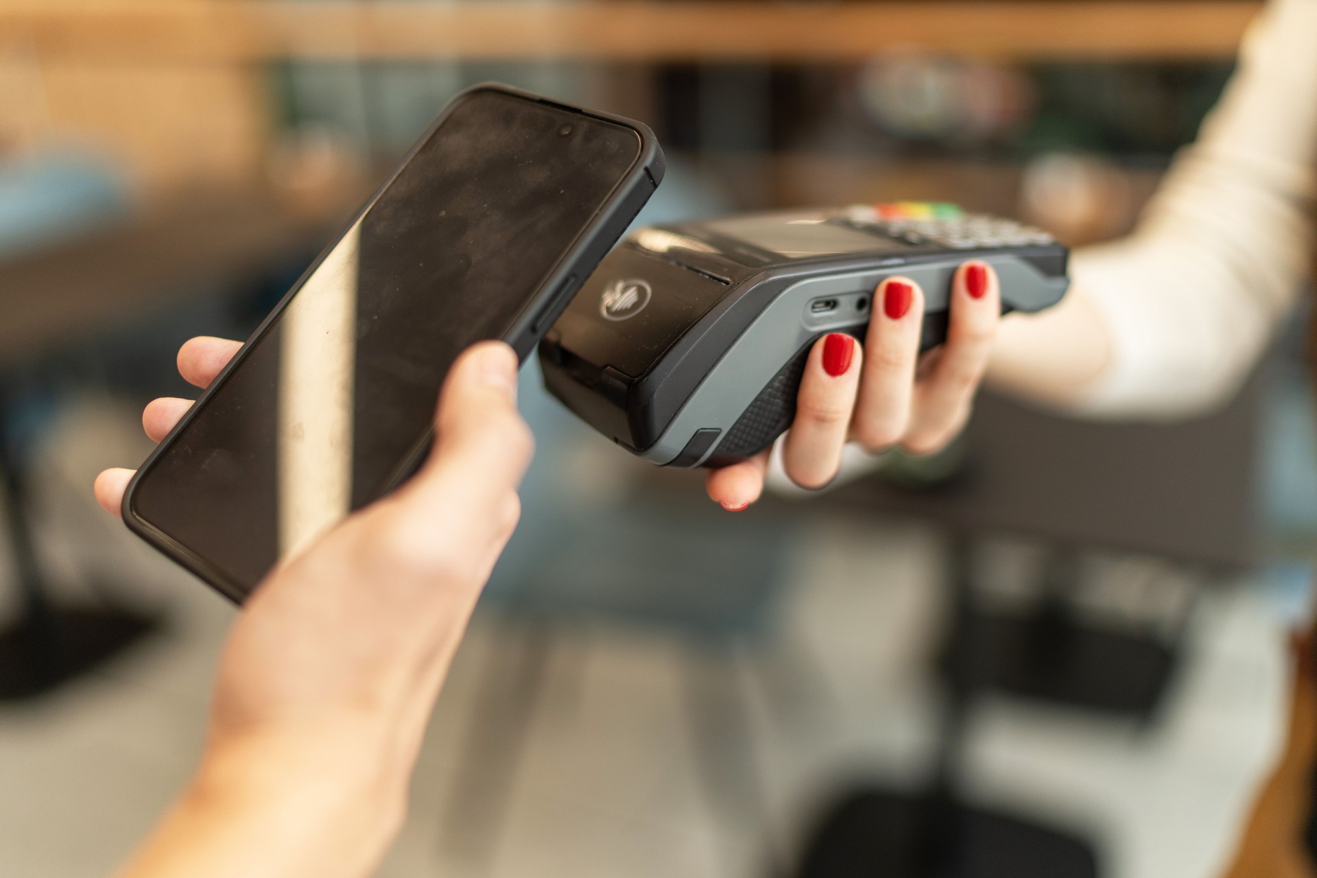 Unrecognizable people making an online payment.
